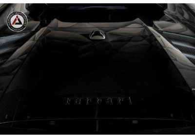 High-performance Ferrari car engine with sleek black finish and advanced engineering. Perfect for automotive enthusiasts seeking speed, power, and luxury.
